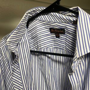Striped down white and blue dress shirt.